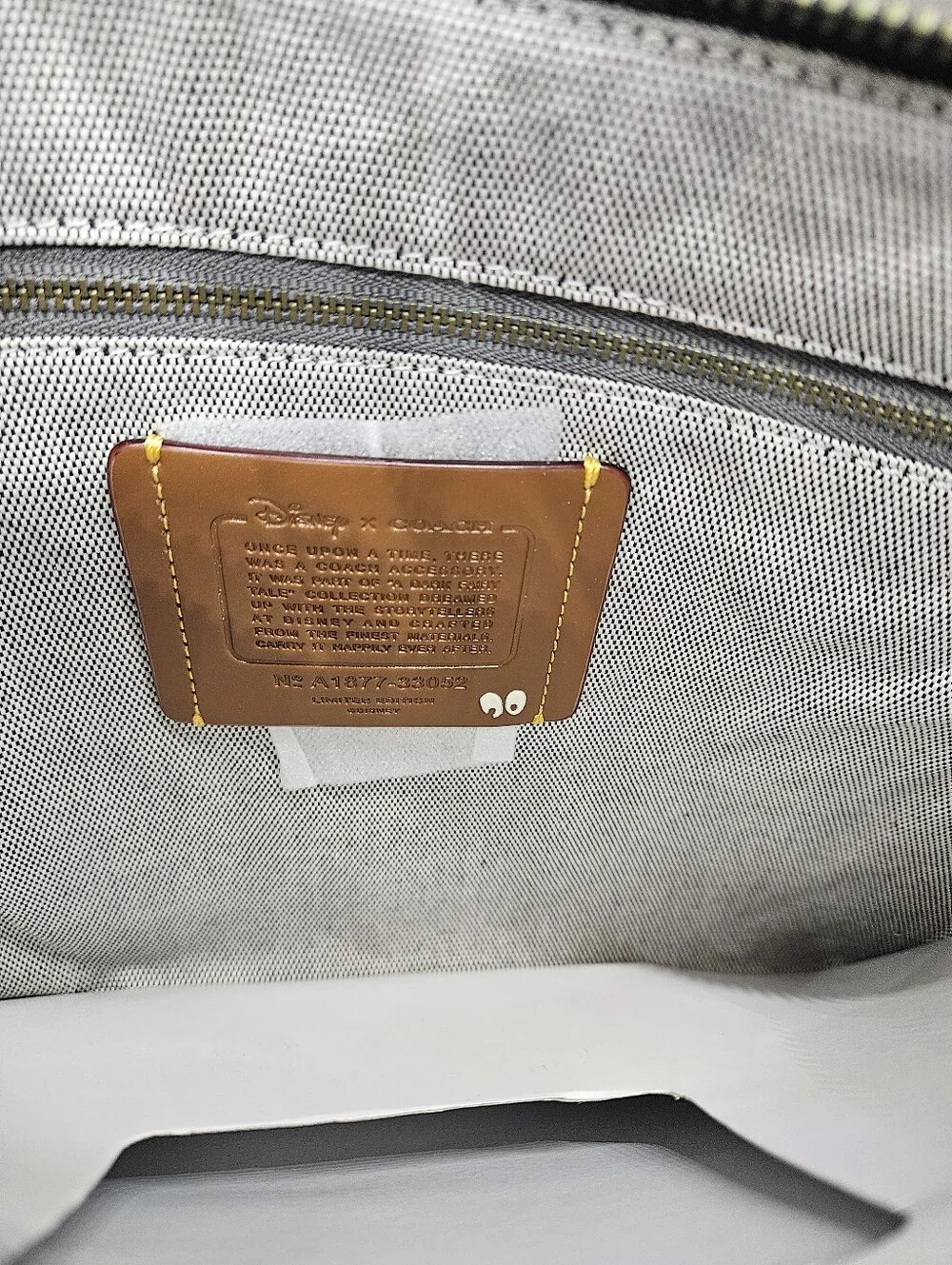 Coach x Disney Turnlock Wristlet 30
